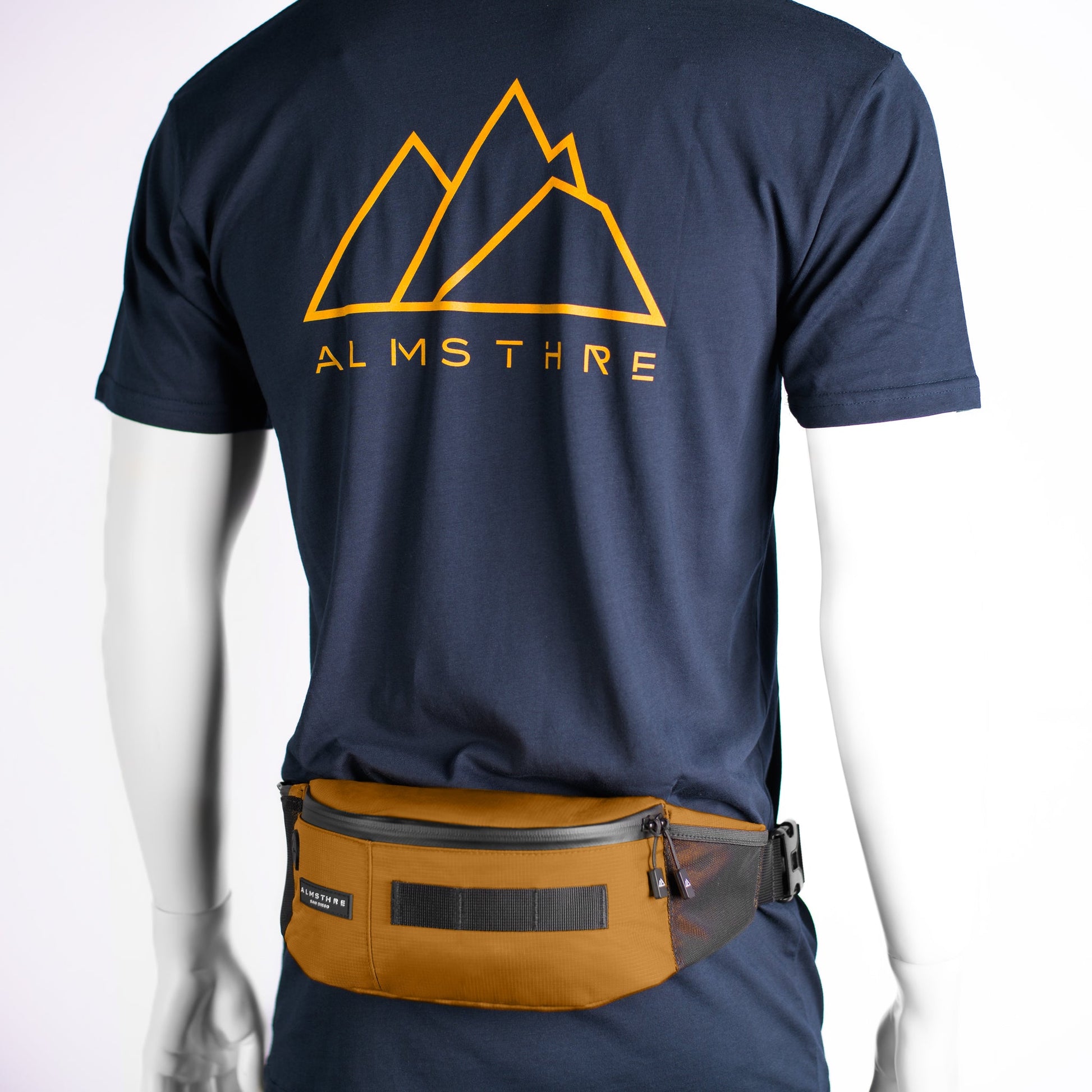 https://cdn.shopify.com/s/files/1/0493/2776/7713/files/ALMSTHRECyclingHipPackGold2.jpg?v=1759868026
