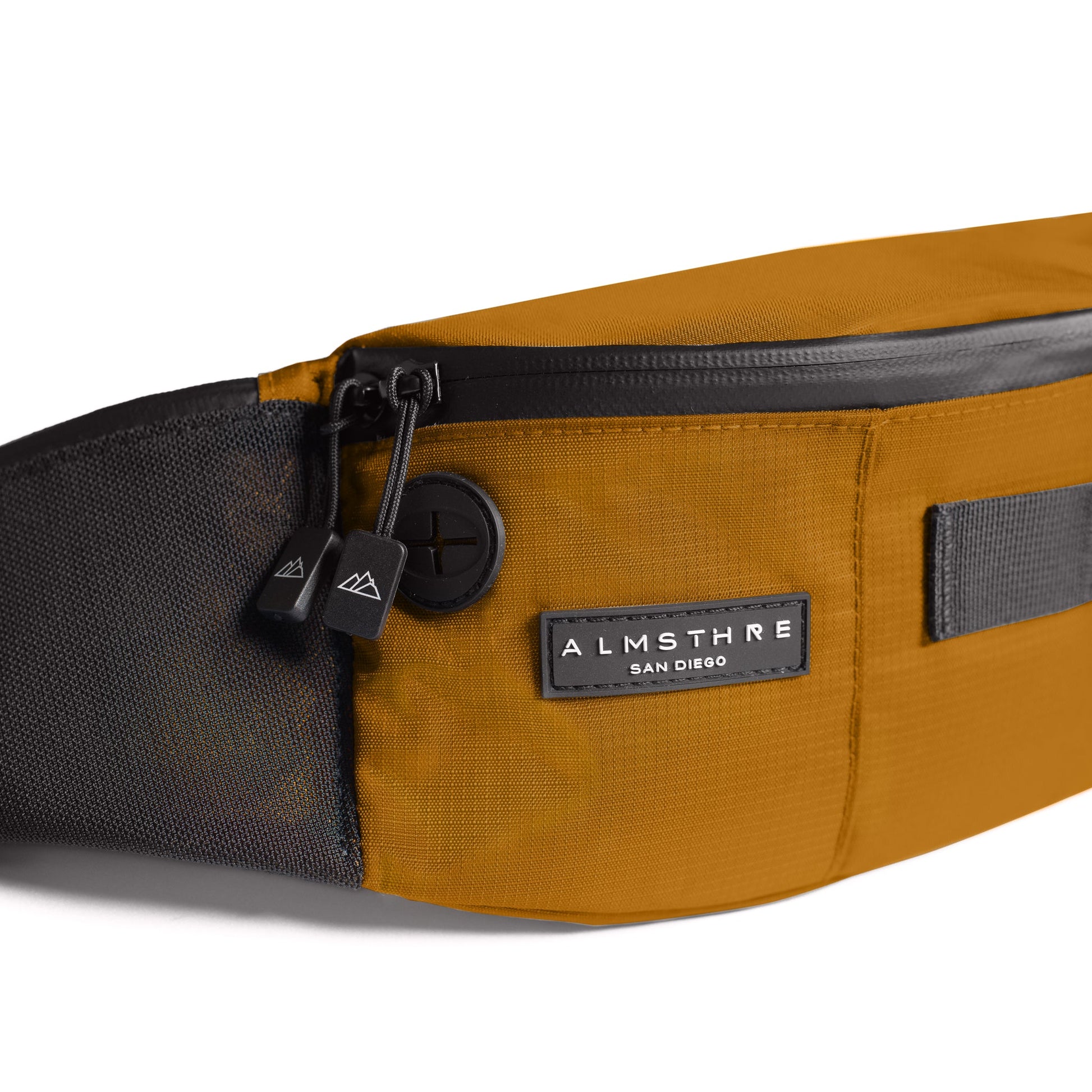 https://cdn.shopify.com/s/files/1/0493/2776/7713/files/ALMSTHRECyclingHipPackGold3.jpg?v=1759868026